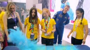 Tim Peake with Dr Suzie Imber and schoolchildren at the National Space Centre in Leicester.