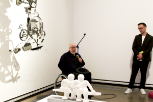 Tony Heaton OBE and Director Andrew Fletcher giving a speech in the corner of the gallery.